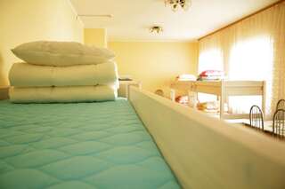 Хостелы Hostel Old Bridge Гродно Односпальная кровать в общем номере для мужчин и женщин-2